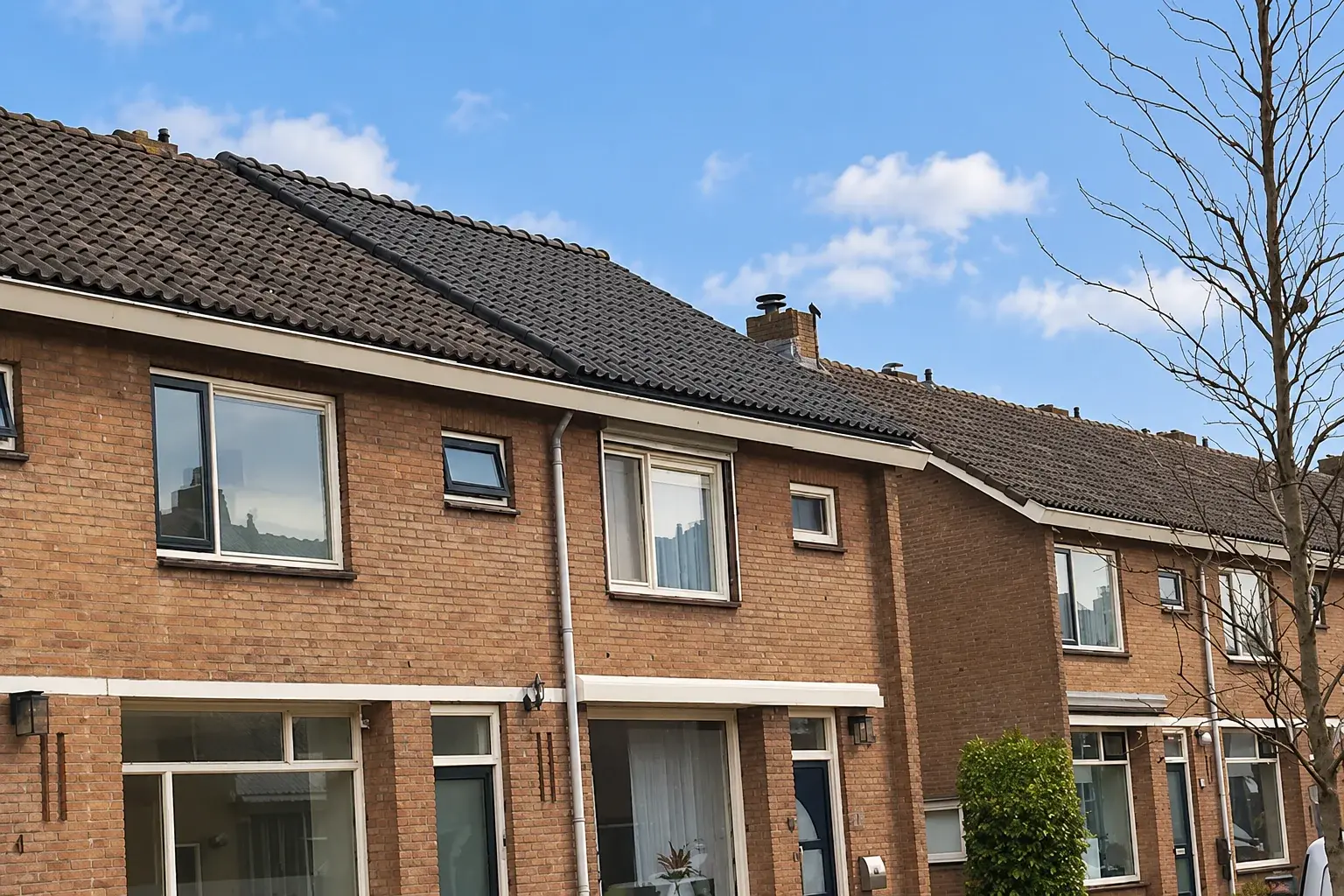 Klapwijk aannemersbedrijf woningen gevels zonnig